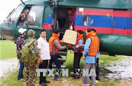 Quân đội Việt Nam hỗ trợ Lào khắc phục sự cố vỡ đập thủy điện